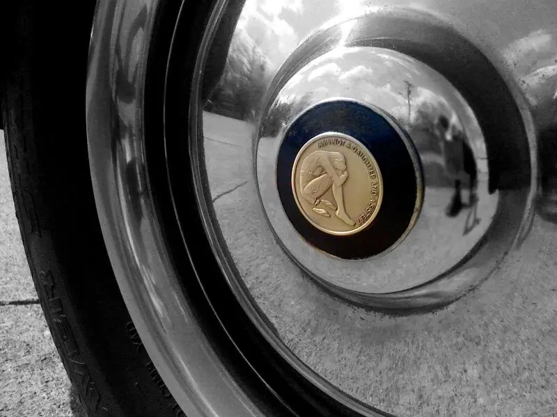 A King Tribe medallion set into the centre of a chrome wheel hub